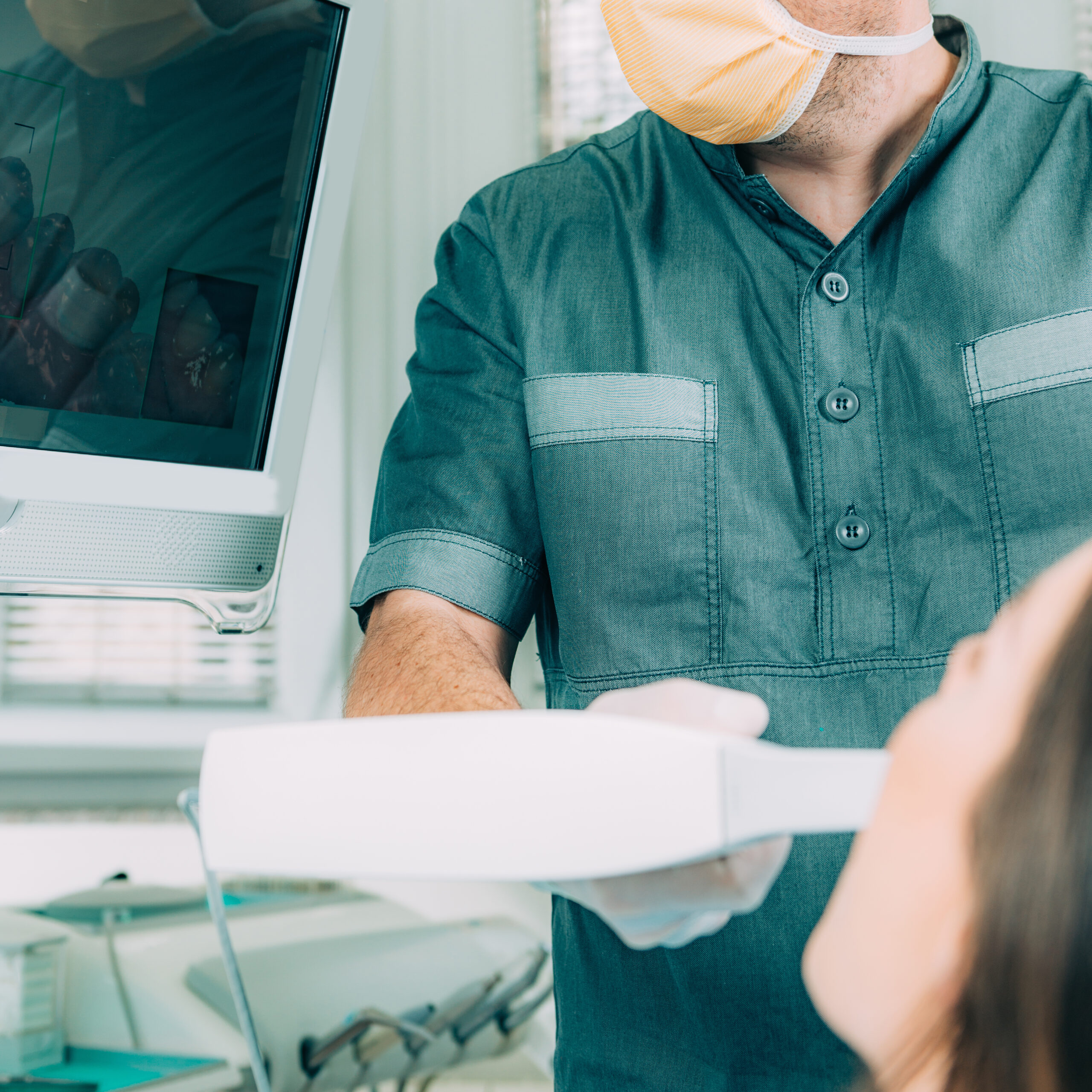 Dentist using dental camera